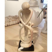 Custom Sculpture of Mother & Children on Black Marble Base