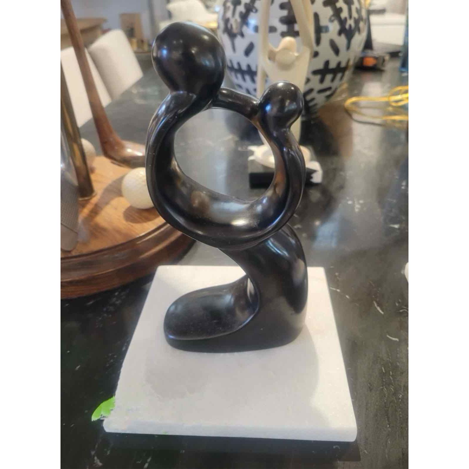 Mother & Son Sculpture on White Marble Base