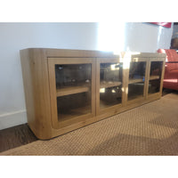Oslo Glass 4-door Media Console in Aged Natural Oak