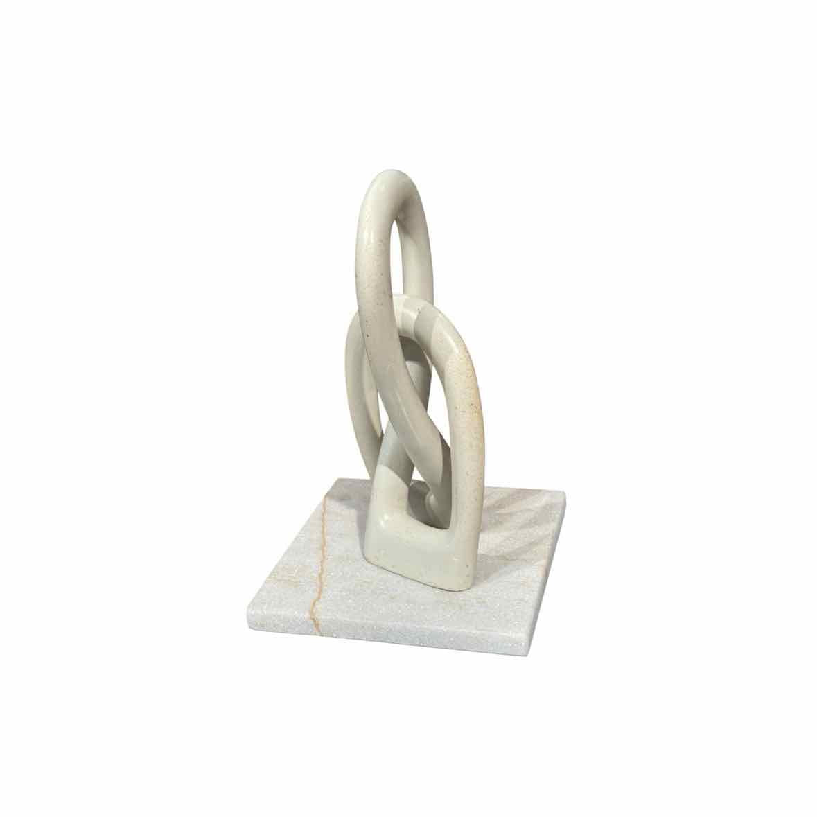 Infinity Loops Sculpture on White Marble Base