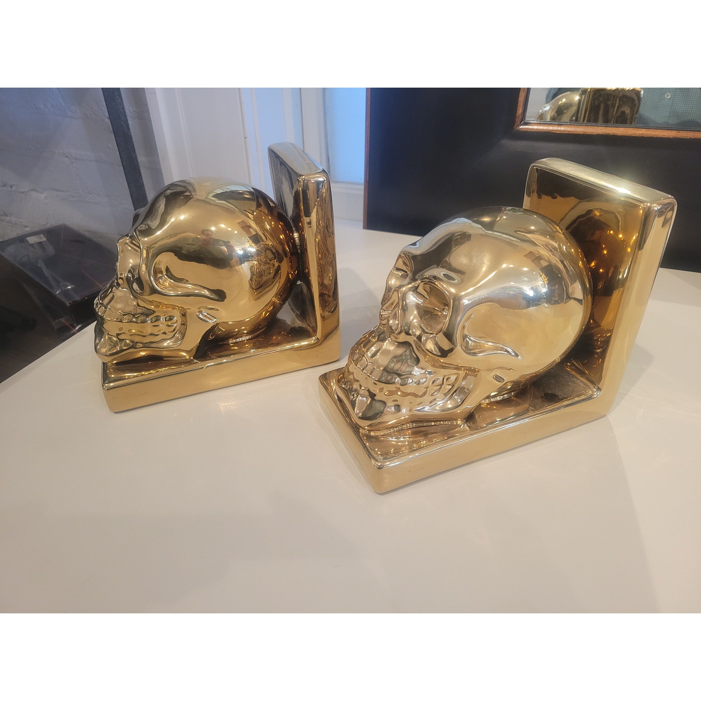 PAIR of Gold Skull Bookends - colletteconsignment.com