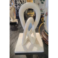 Infinity Loops Sculpture on White Marble Base