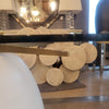 Stone White Concrete & Brass Dining Table w/ Glass Top - AS IS