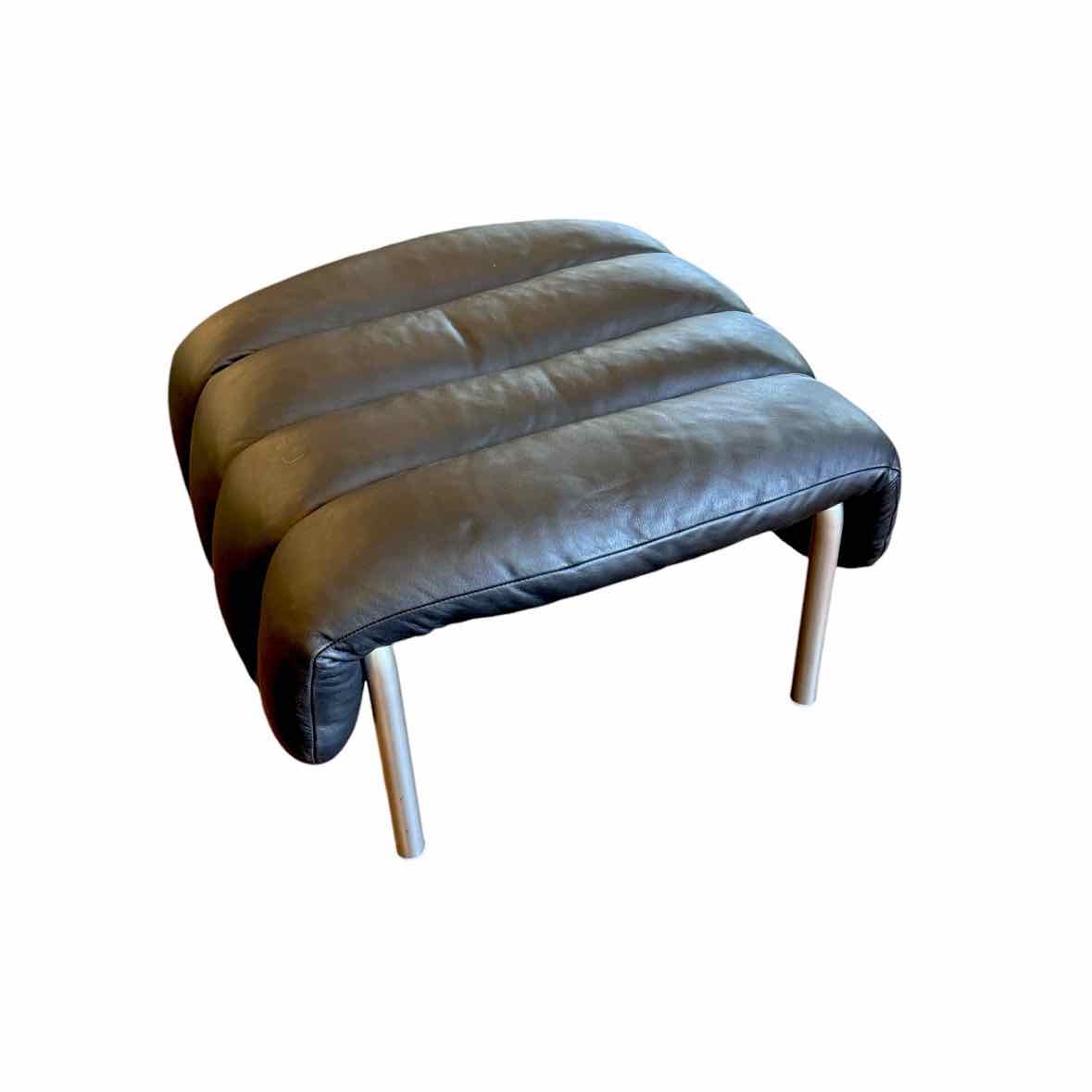 D2CZ2TZH-'Puffy' Ottoman, Black Leather / Stainless, Art. no. 20352 Design by Fa