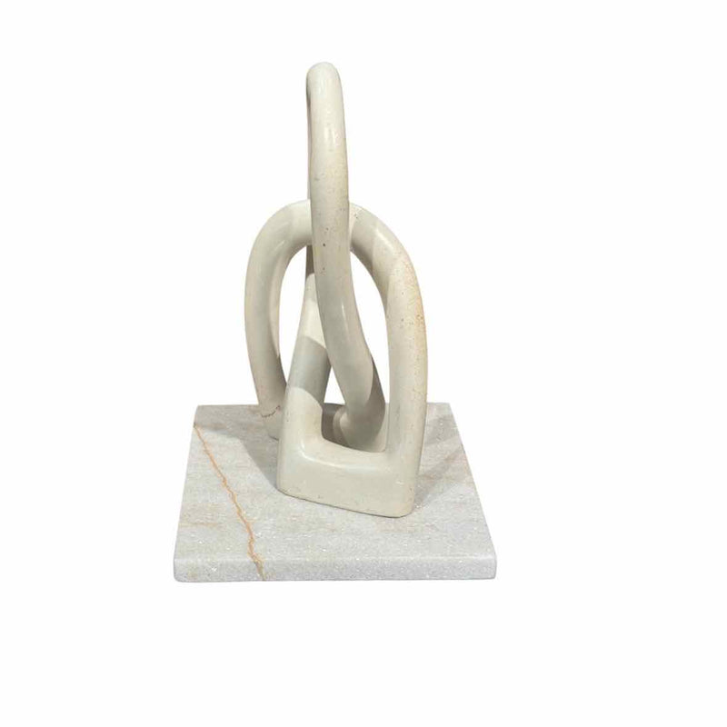 Infinity Loops Sculpture on White Marble Base
