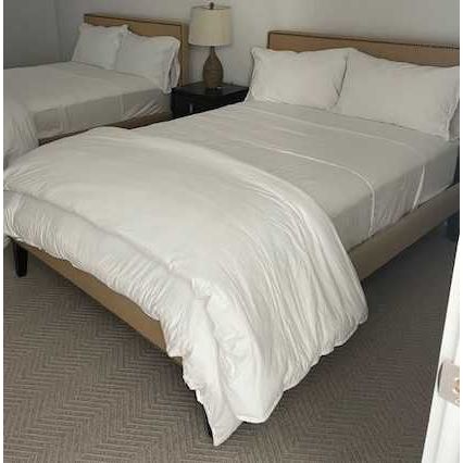 Full-Sized Tan Tufted Fabric Bed