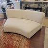 Custom Armless Curved Sofa in Off-White Boucle w/ Dark Wood Base