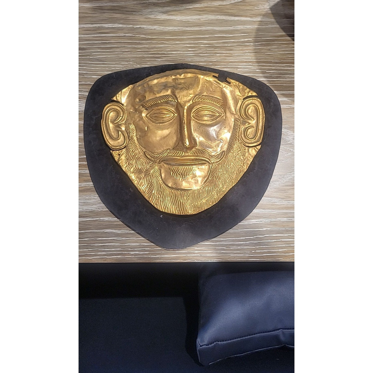 Brass Mask of Agamemnon on Black Board - colletteconsignment.com