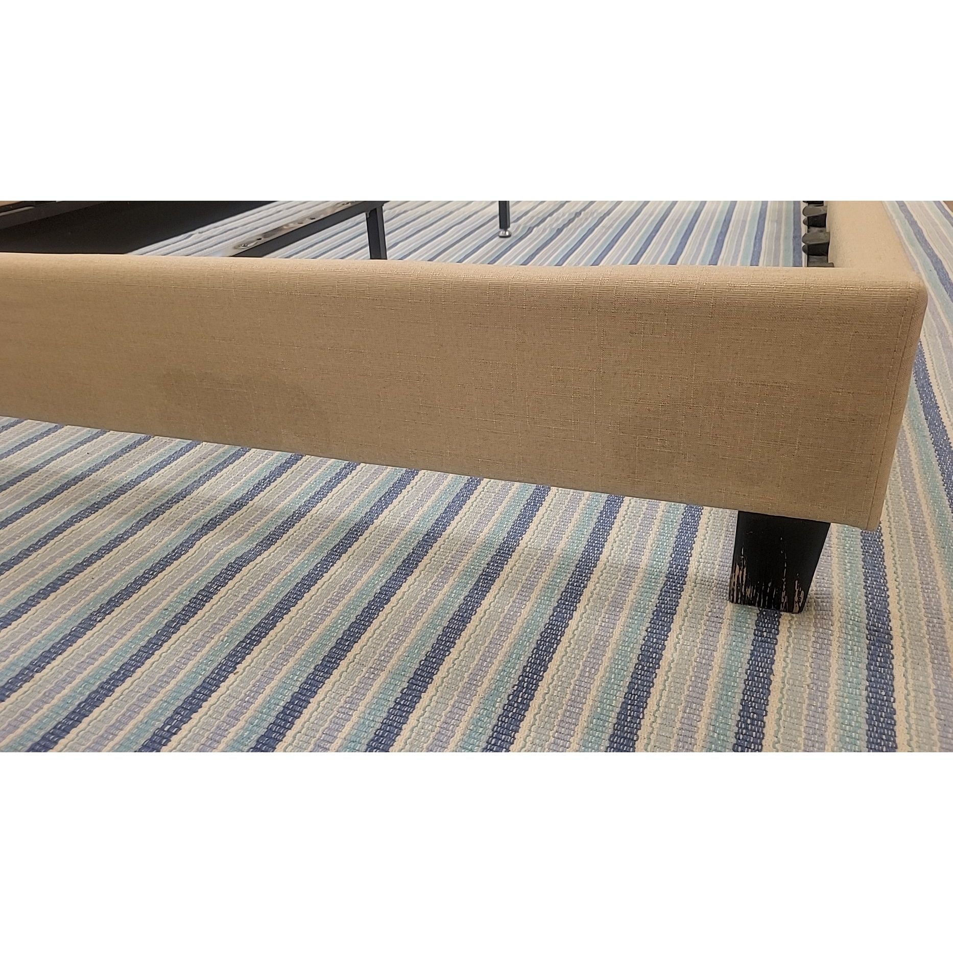 Queen-Sized Beige Upholstered Nailhead Bed