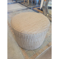 Tan Upholstered Storage Ottoman on Casters
