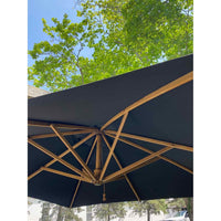 Sidewind Outdoor Umbrella in Black by Bambrella - colletteconsignment.com
