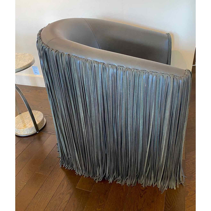 Shaggy Leather Swivel Armchair by Ngala Trading Co. - colletteconsignment.com